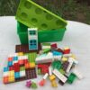Lot de gros legos variés dans leur boîte JOU.in