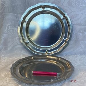 Un plat rond de présentation inox Cui.c2