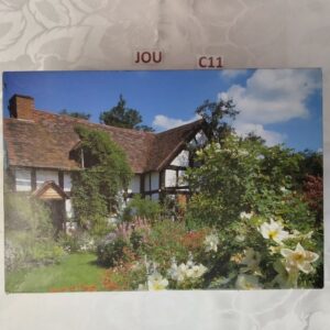 Puzzle 500 pièces d'une maison avec jardin de fleurs jou.c11