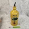 Grande bouteille pour mettre l'huile jaune avec un olivier cui.c8